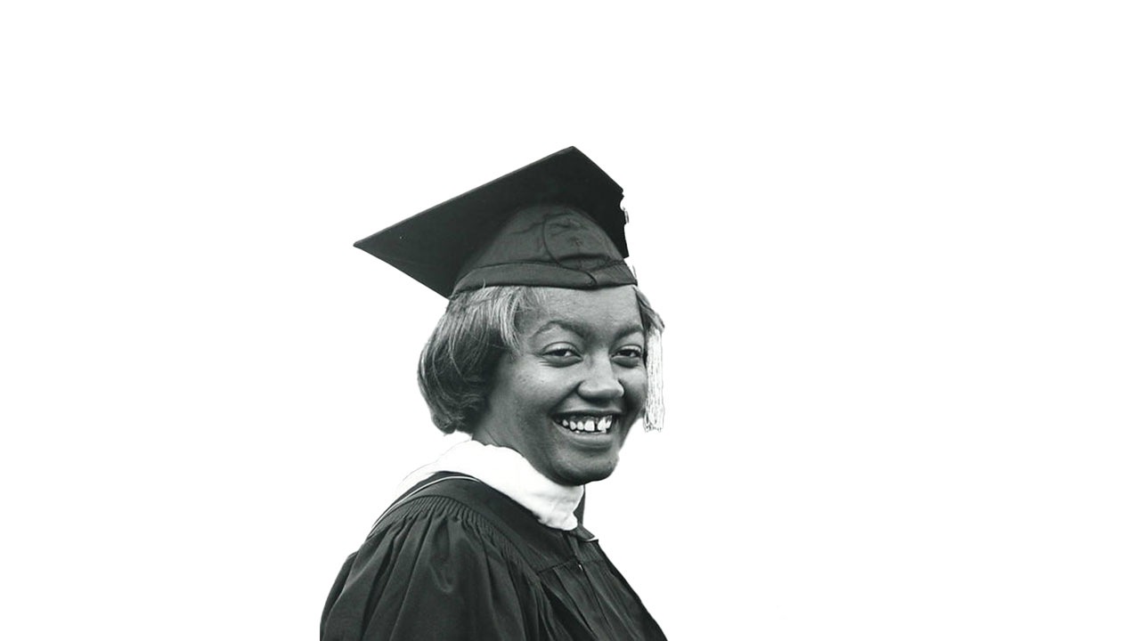 Josetta Matthews is pictured wearing a cap and gown